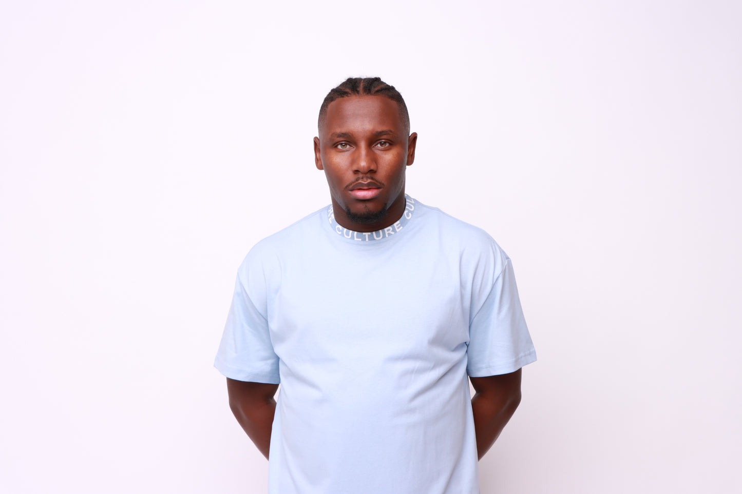 Unisex 100% cotton light blue T-shirt with neck taped CULTURE logo designed by culture clothing UK