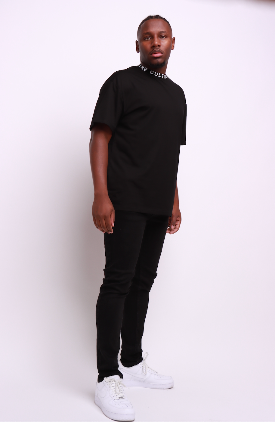 Unisex 100% cotton black T-shirt with neck taped CULTURE logo designed by culture clothing UK